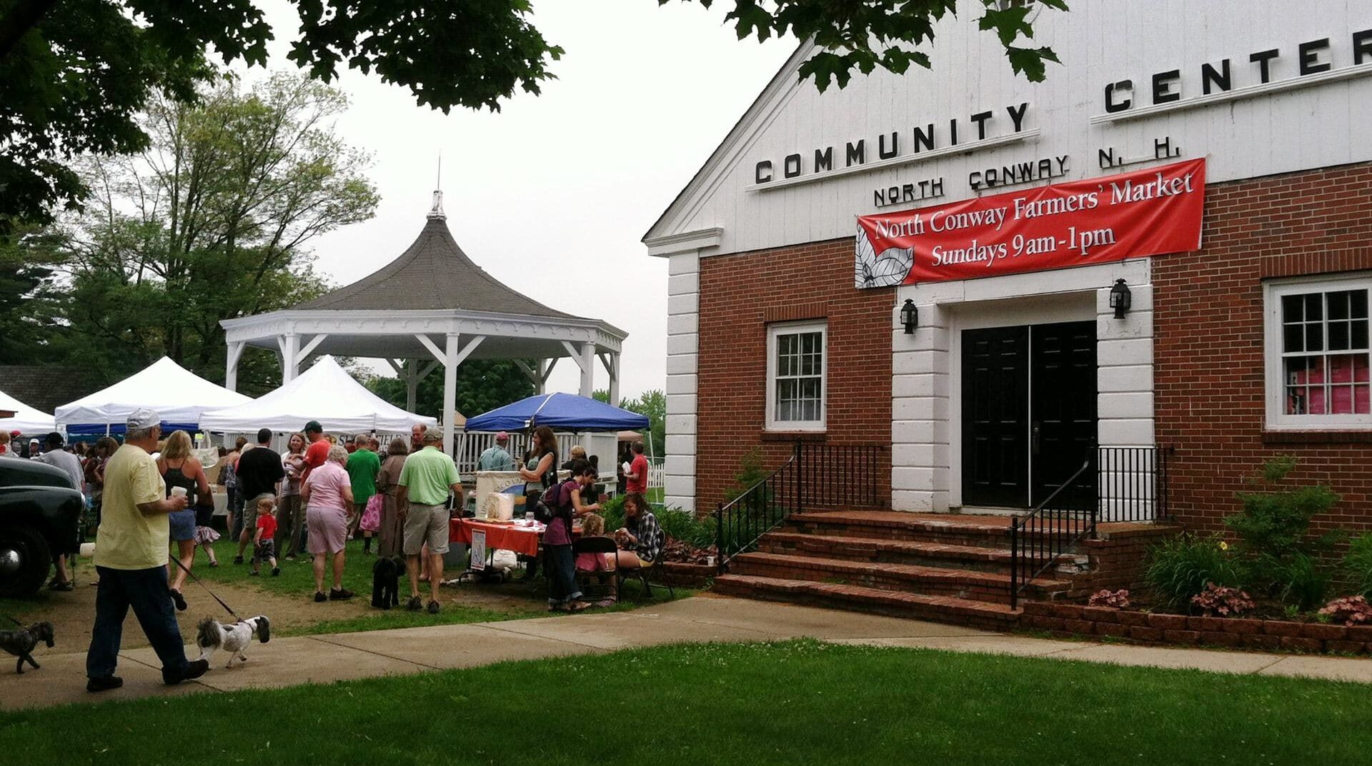 people gathered at the North Conway Farmers market New Hampshire