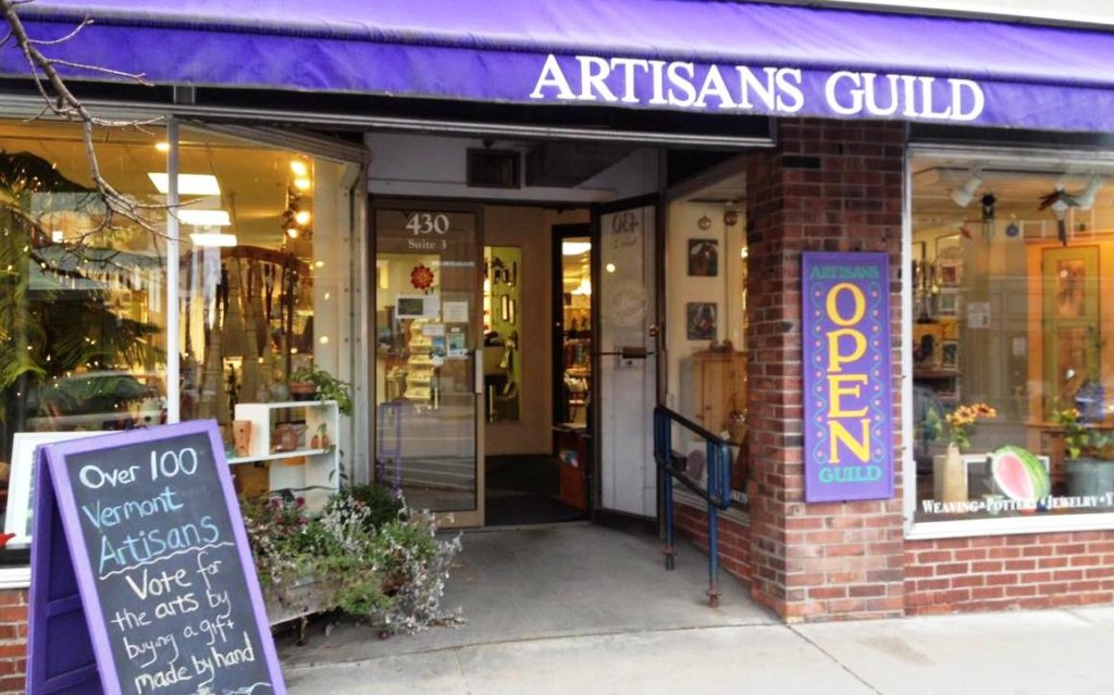 front entrance and sign of the Northeast Kingdom artisans guild craft gallery St Johnsbury Vermont