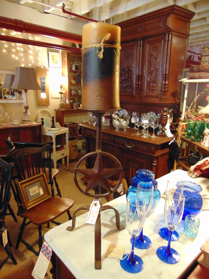 bright blue glassware on a table at an antique store