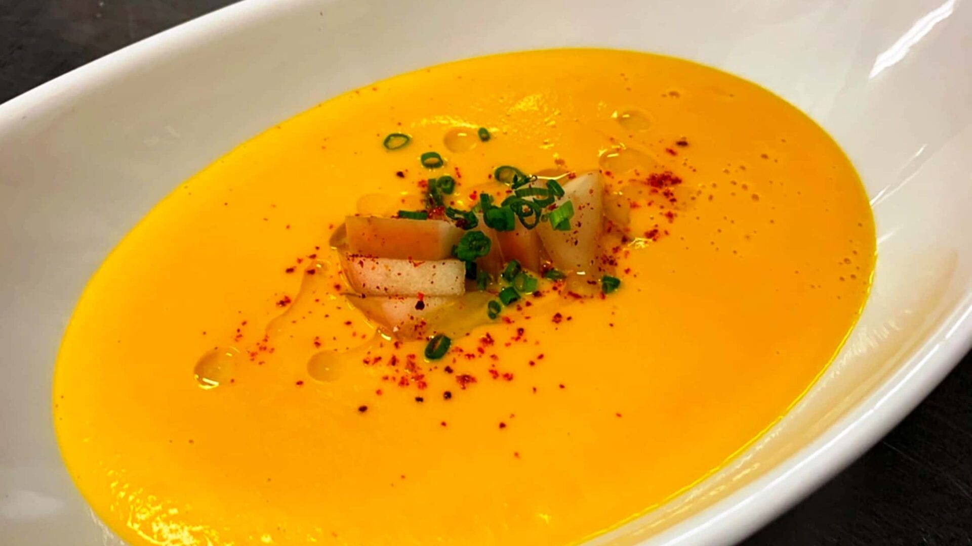 a bowl of carrot ginger soup|Carrot Ginger soup recipe from Rabbit Hill Inn|Carrot ginger soup recipe at Rabbit Hill Inn||carrot ginger soup recipe|