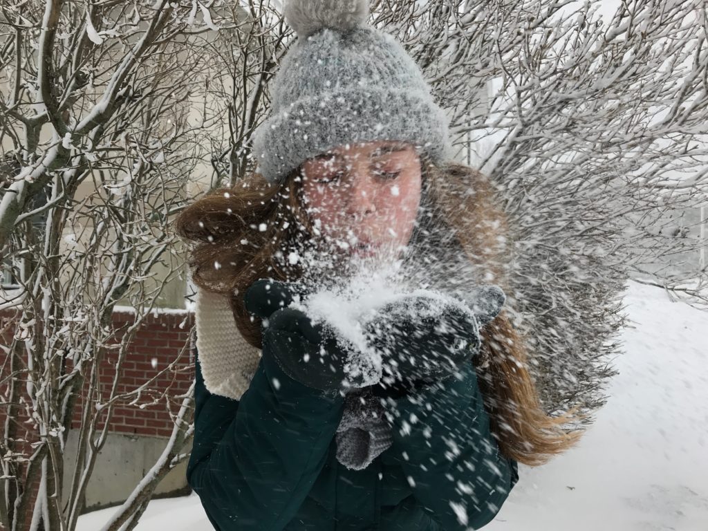 girl playing with snow at Rabbit Hill Inn