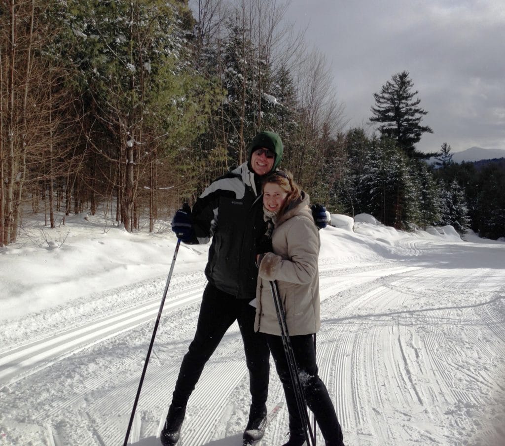 Couple cross country skiing at Ski Hearth Farm