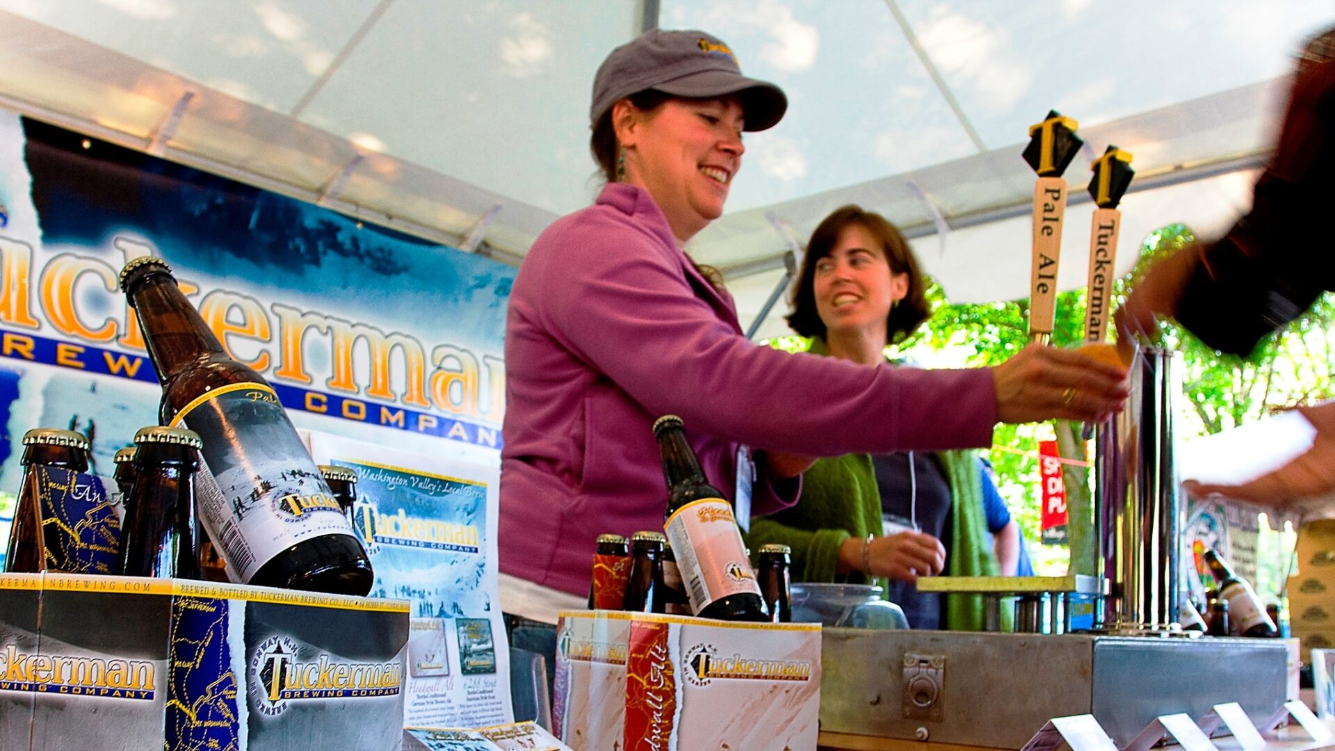 girl serving beer at the New England Brewfest Craft beer weekend Lincoln Woodstock New Hampshire|girl serving beer at the New England Brewfest Craft beer weekend Lincoln Woodstock New Hampshire|girl serving beer at the brewery festival|New England Brewfest Craft beer weekend Lincoln Woodstock New Hampshire|New England Brewfest 2018 Lincoln Woodstock NH