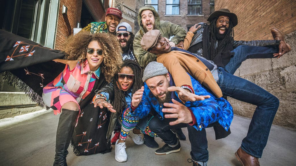 musical group dancing in the street 