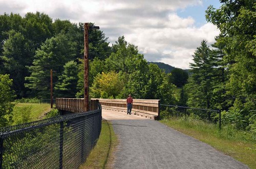 man standing on road at Three Rivers Bike path St. Johnsbury VT near Rabbit Hill Inn