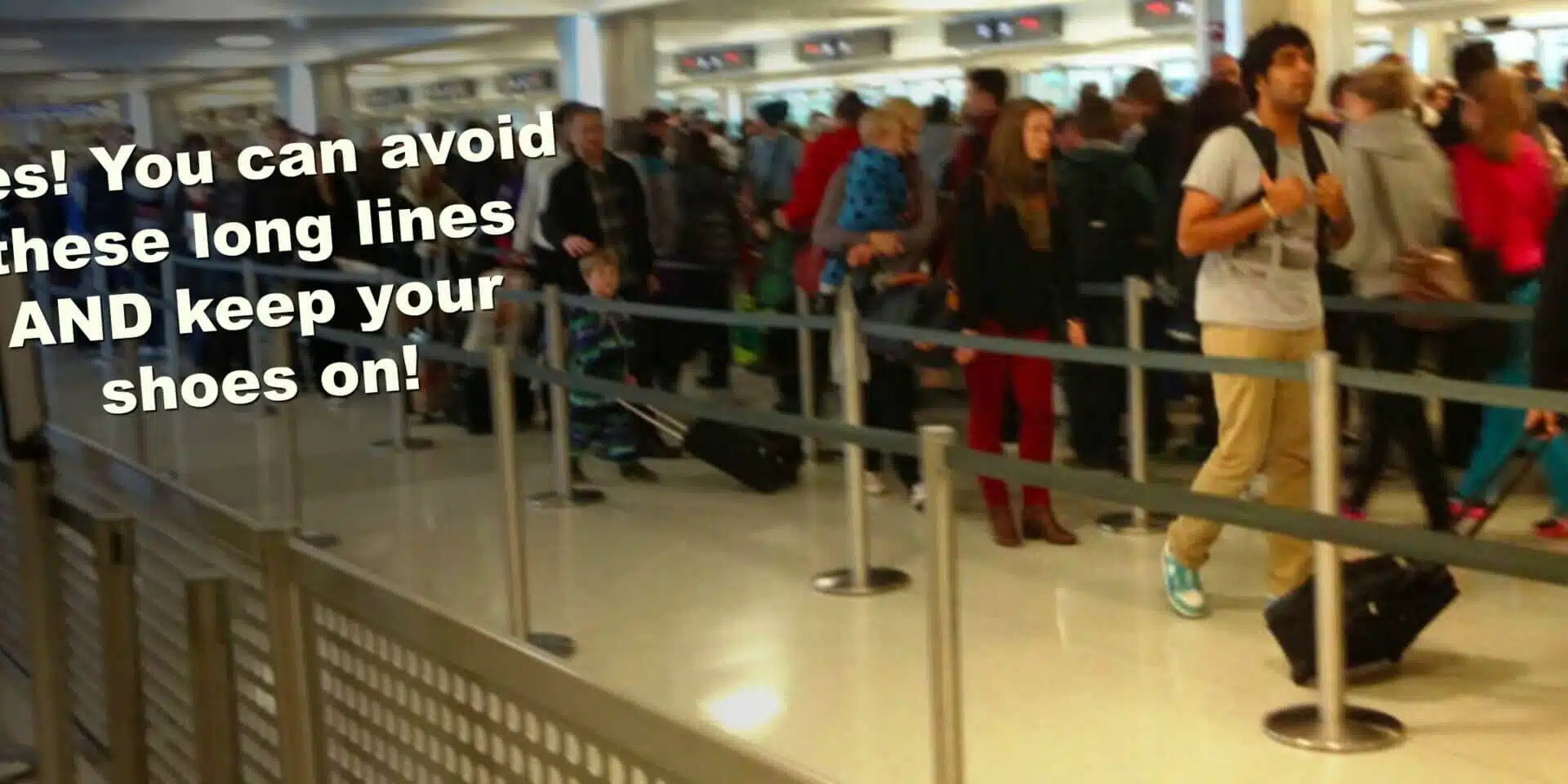 people standing in line at an airport